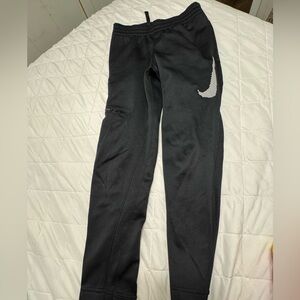 Nike Kids Black Sweatpants with White Swoosh